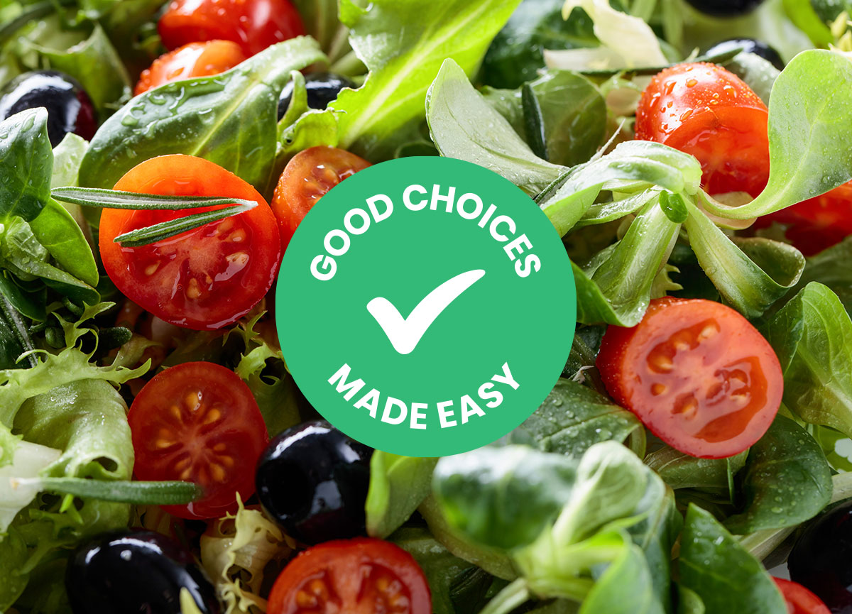 A salad with all sorts of vegetables with a circular logo saying good choices made easy
