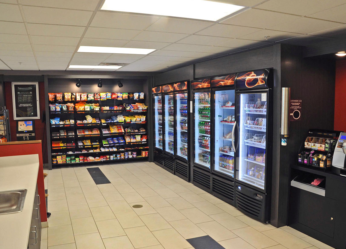 A cafe with snacks, drinks, frozen and refrigerated meals displaying a contemporary café Micromarket